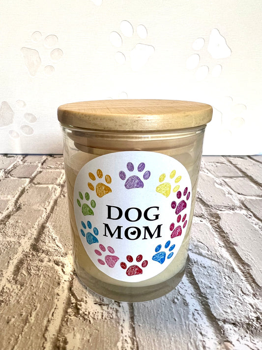 Candle jar with 'Dog Mom' label 